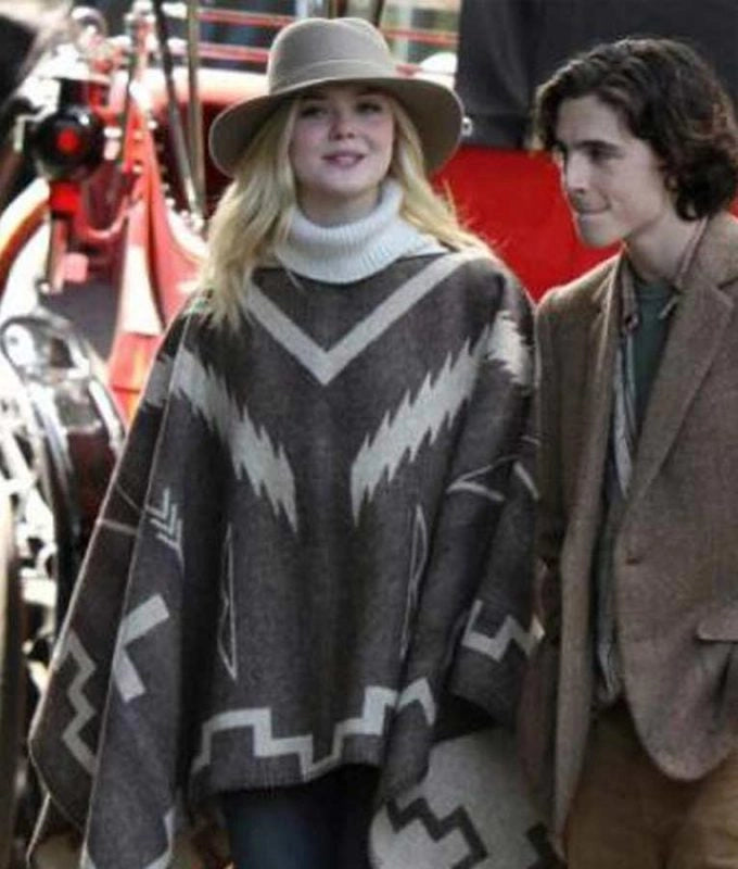 A Rainy Day In New York Elle Fanning Poncho